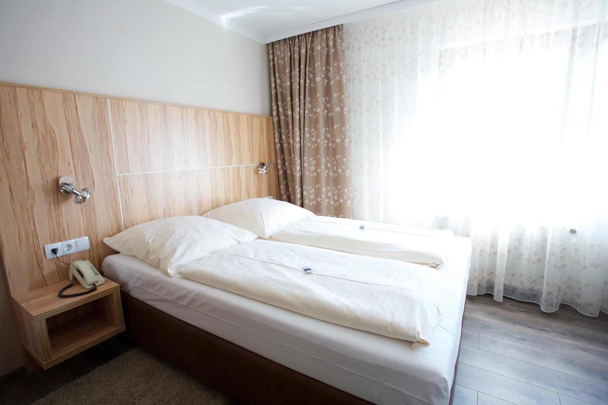 Hotel Reinhardtshof Garni Wolfschlugen Værelse billede