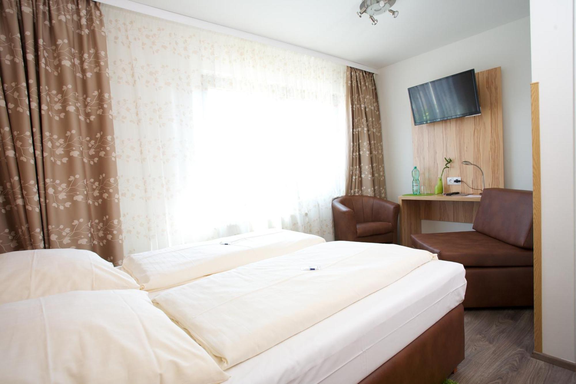 Hotel Reinhardtshof Garni Wolfschlugen Værelse billede